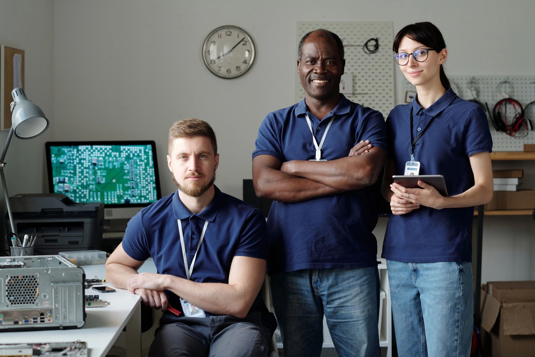 diverse electronics repair team