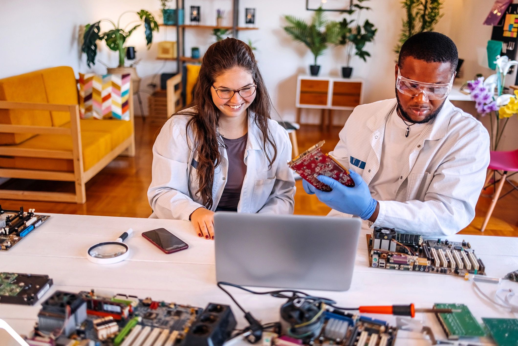 diverse electronics repair team